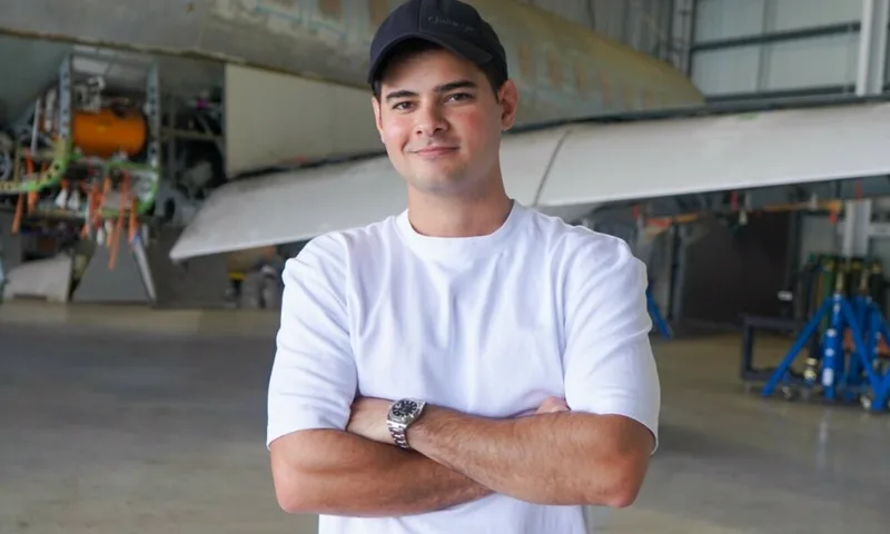 JetEdCo feature photo from the VoyageMIA interview, taken in an aircraft hangar